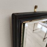 Antique Napoleon III beveled mirror, black and gold