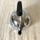 Vintage kettle in chrome metal and bakelite