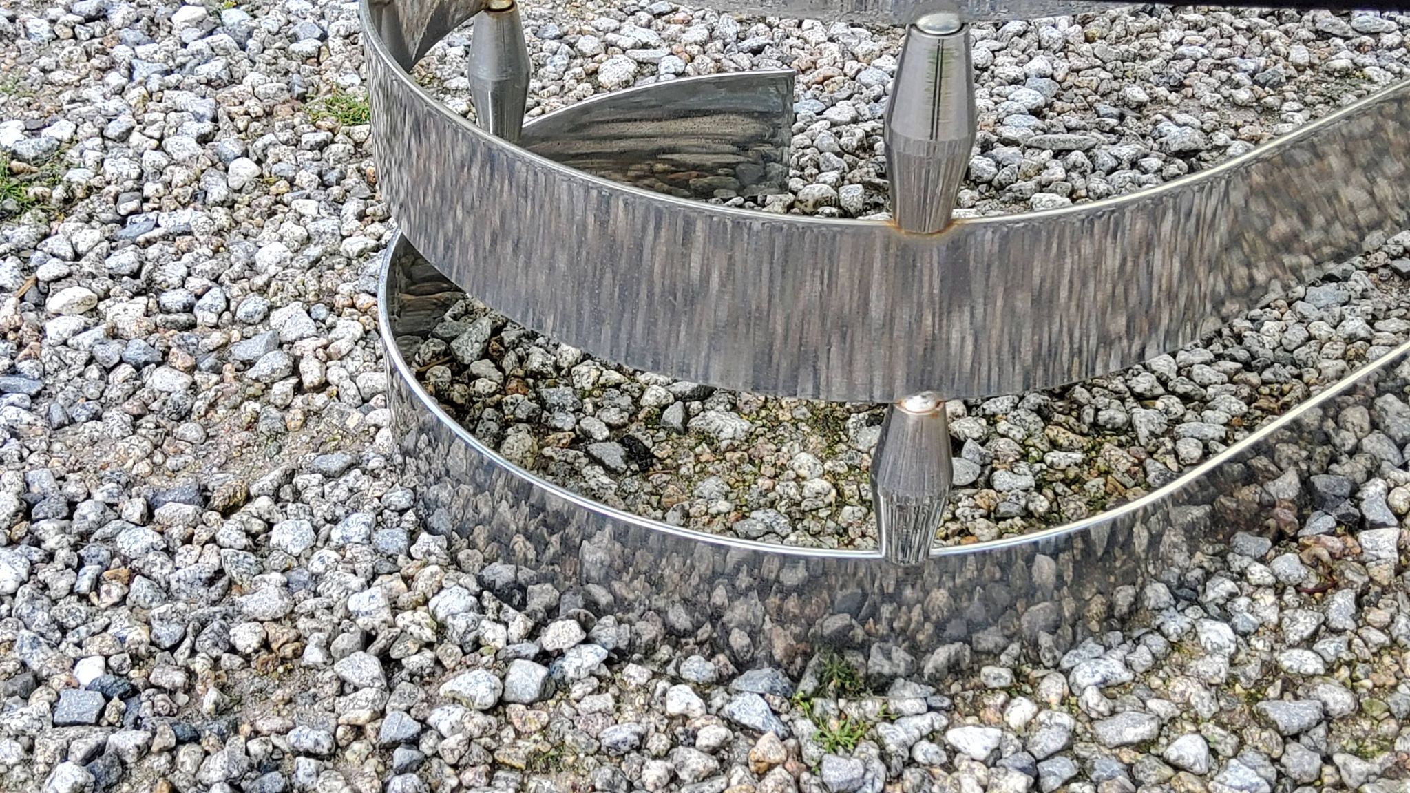 Oval coffee table of the 70s chromed metal base in s smoked glass top