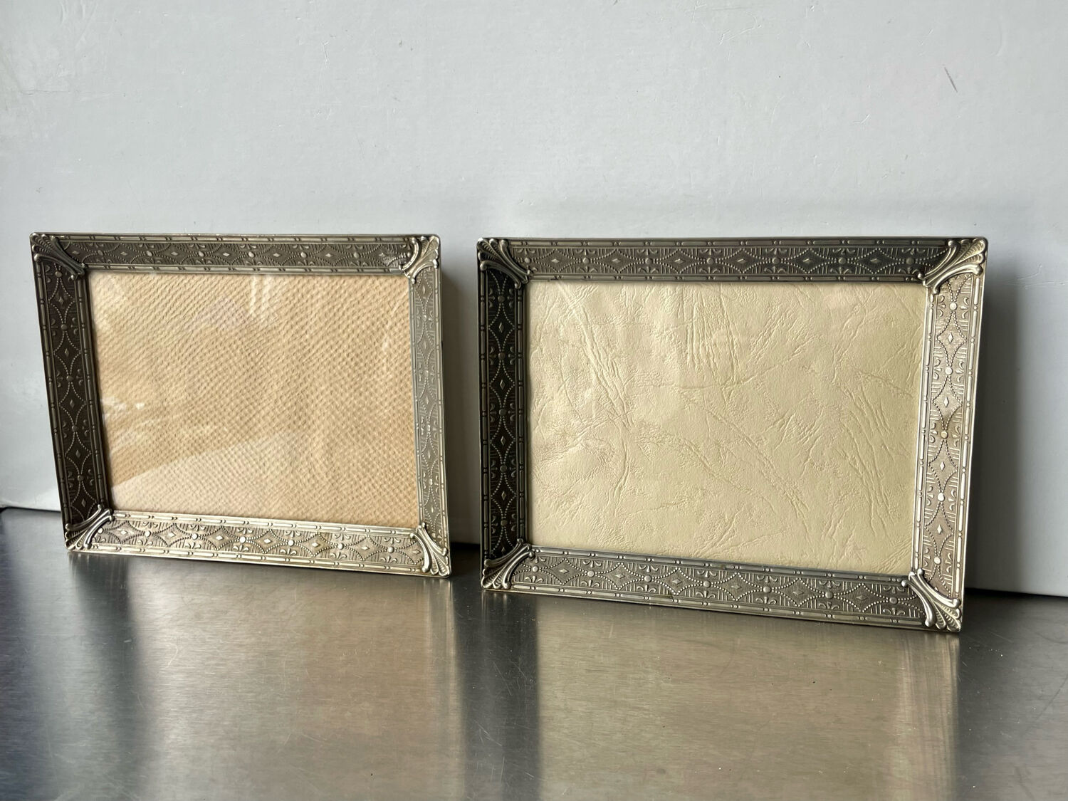 Pair identical vintage metal frames each 18.5 cm x 14.5 cm convex glass