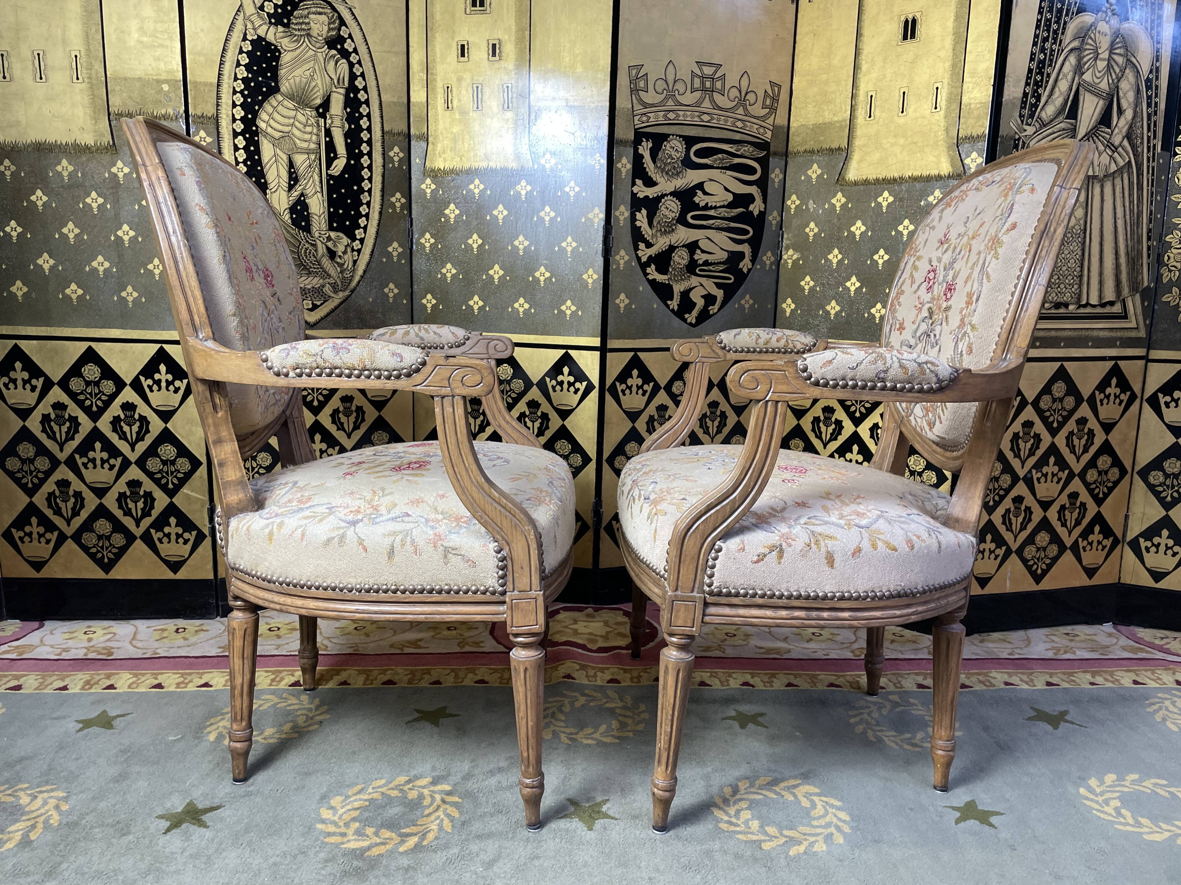 Pair of Louis XVI period medallion armchairs