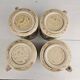 Set of 4 ceramic mugs, glazed stoneware, assorted vintage designs.