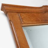 Miroir Art Déco en chêne à décors sculptés et miroir à facettes, années 1930