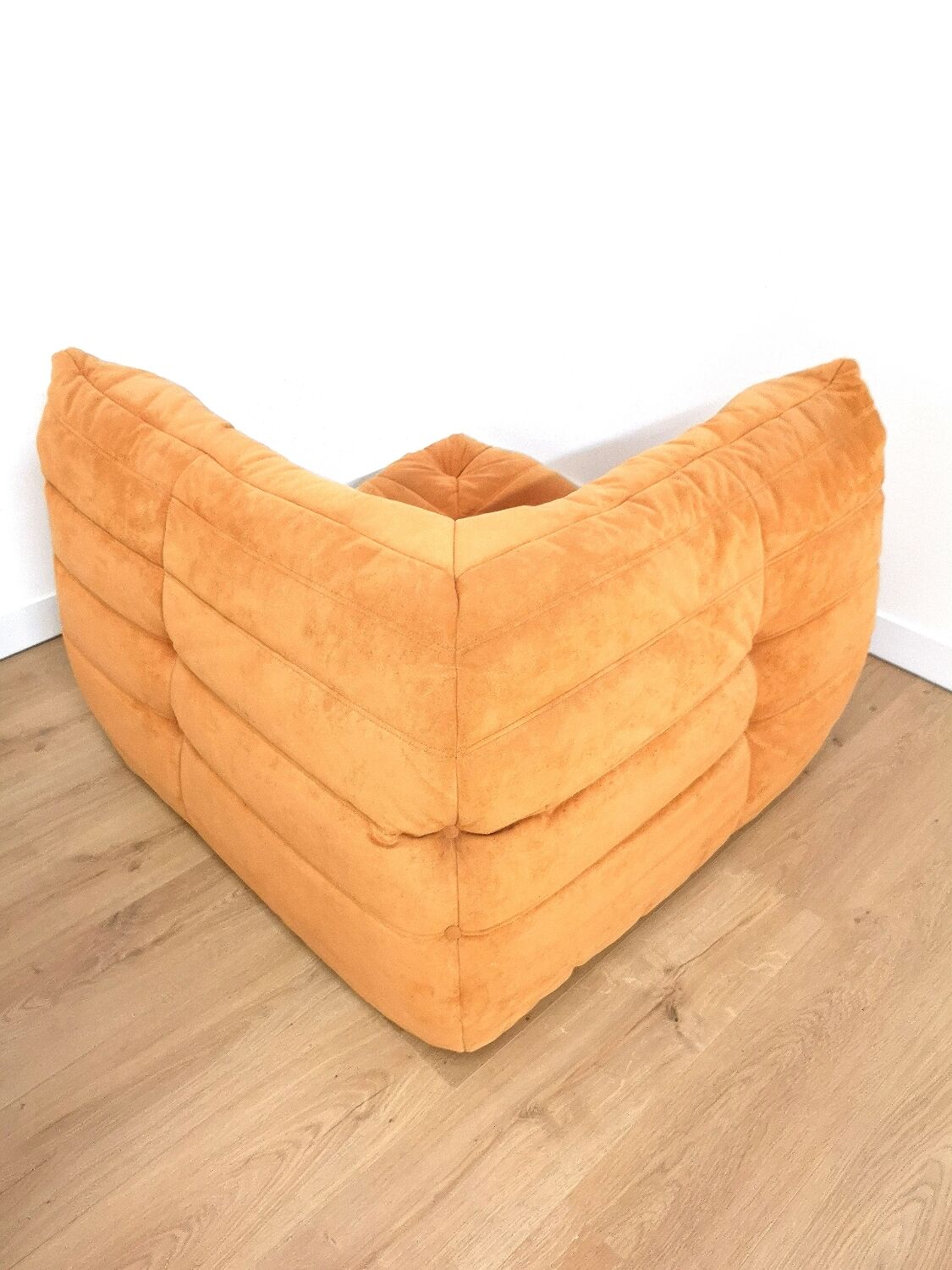 Togo corner armchair in "peach skin" by Michel Ducaroy for Ligne Roset