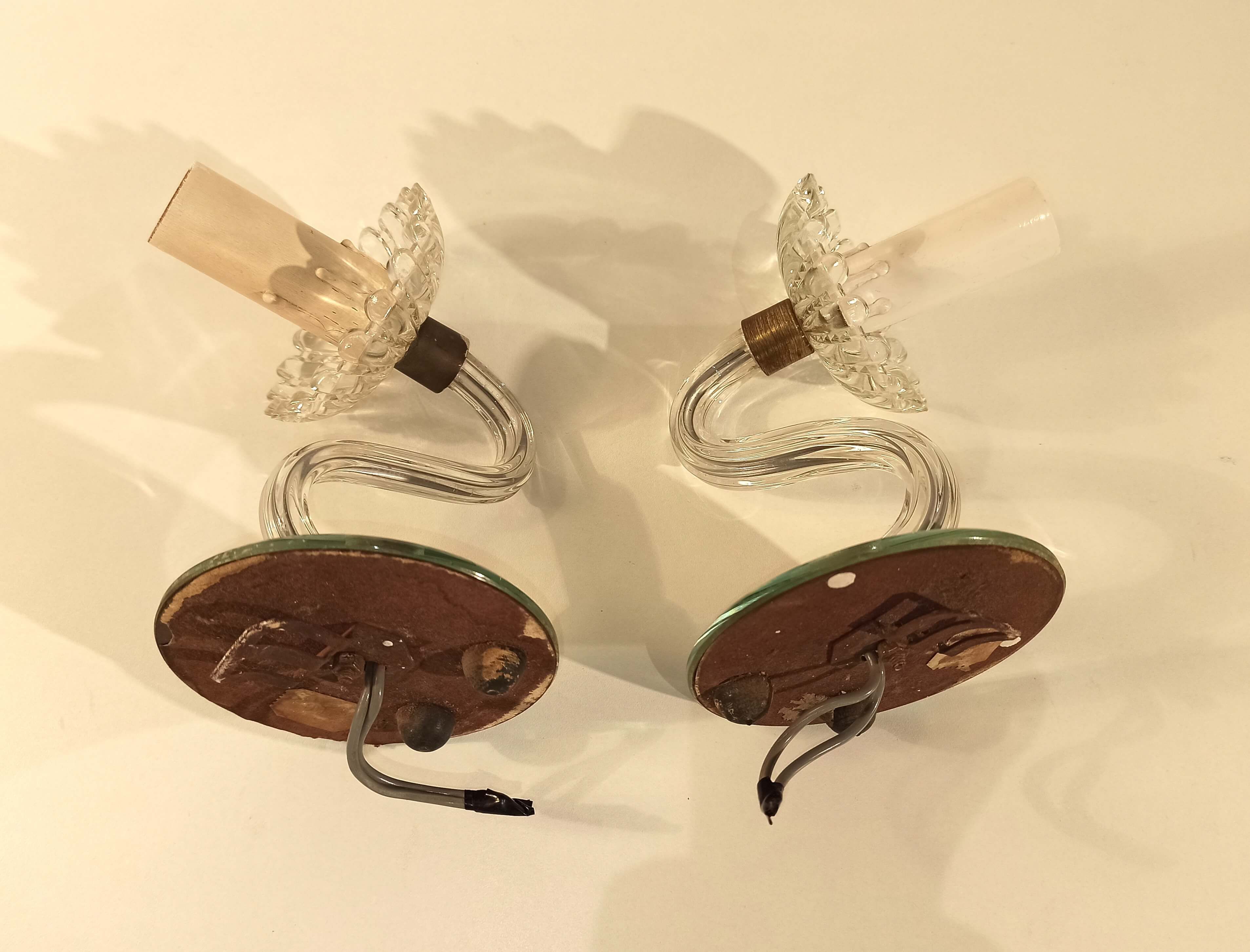 Pair of old glass  wall light and mirror vintage twisted arms