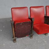 Series of 5 red skai and patinated cast Theater chairs