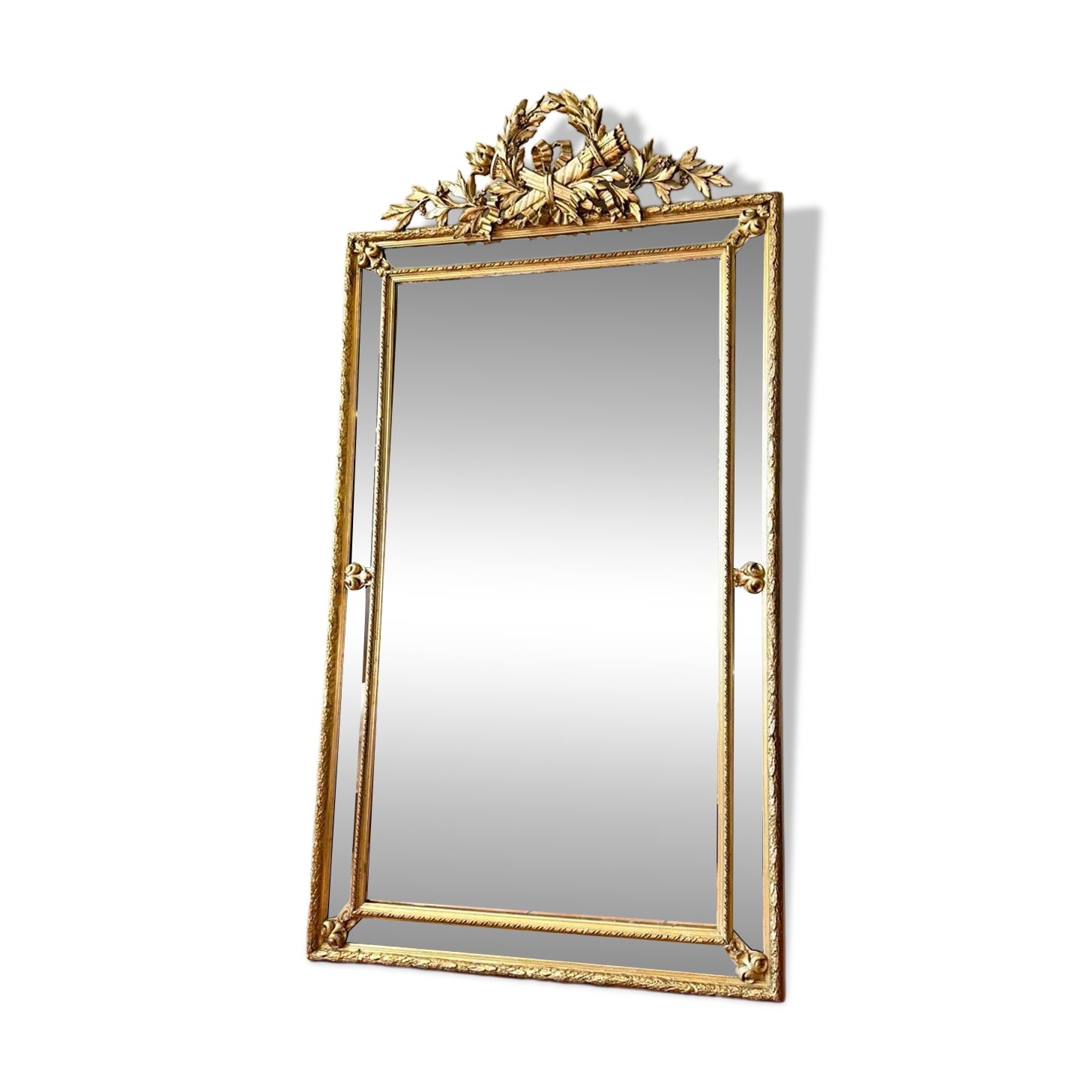Antique gilded mirror with parcloses from the 19th century.