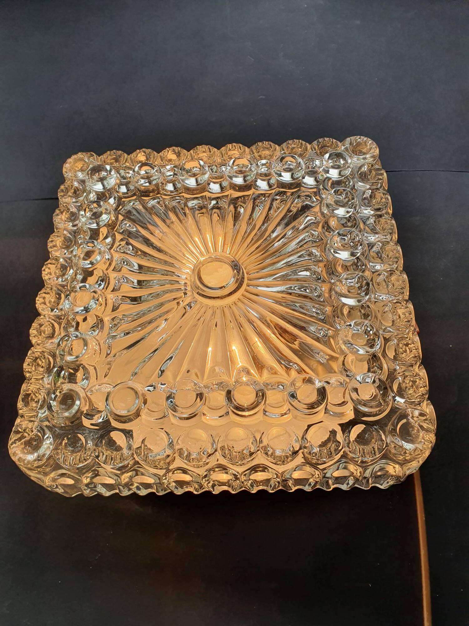 Large ceiling light or vintage wall sconce from the 1970s.