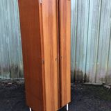 Vintage wardrobe and shelves with formica front doors and oak cp sides.