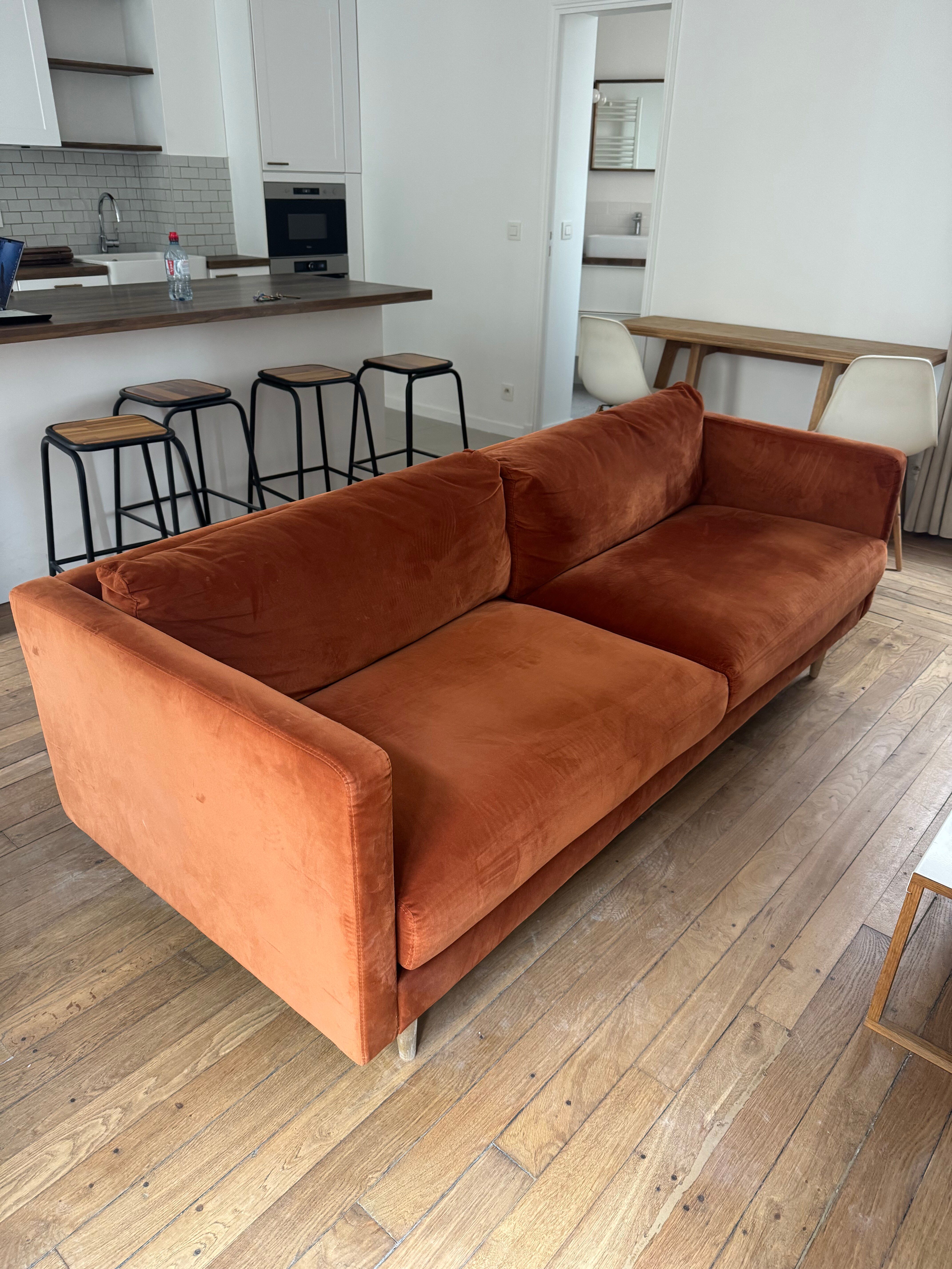 Orange velvet sofa