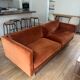 Orange velvet sofa