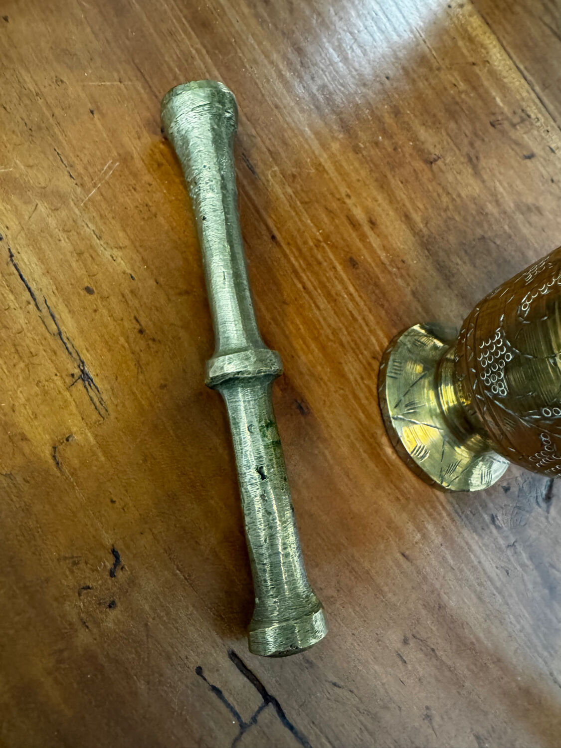 Golden brass mortar and pestle
