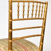 Paire de chaises en bois doré imitant le bambou