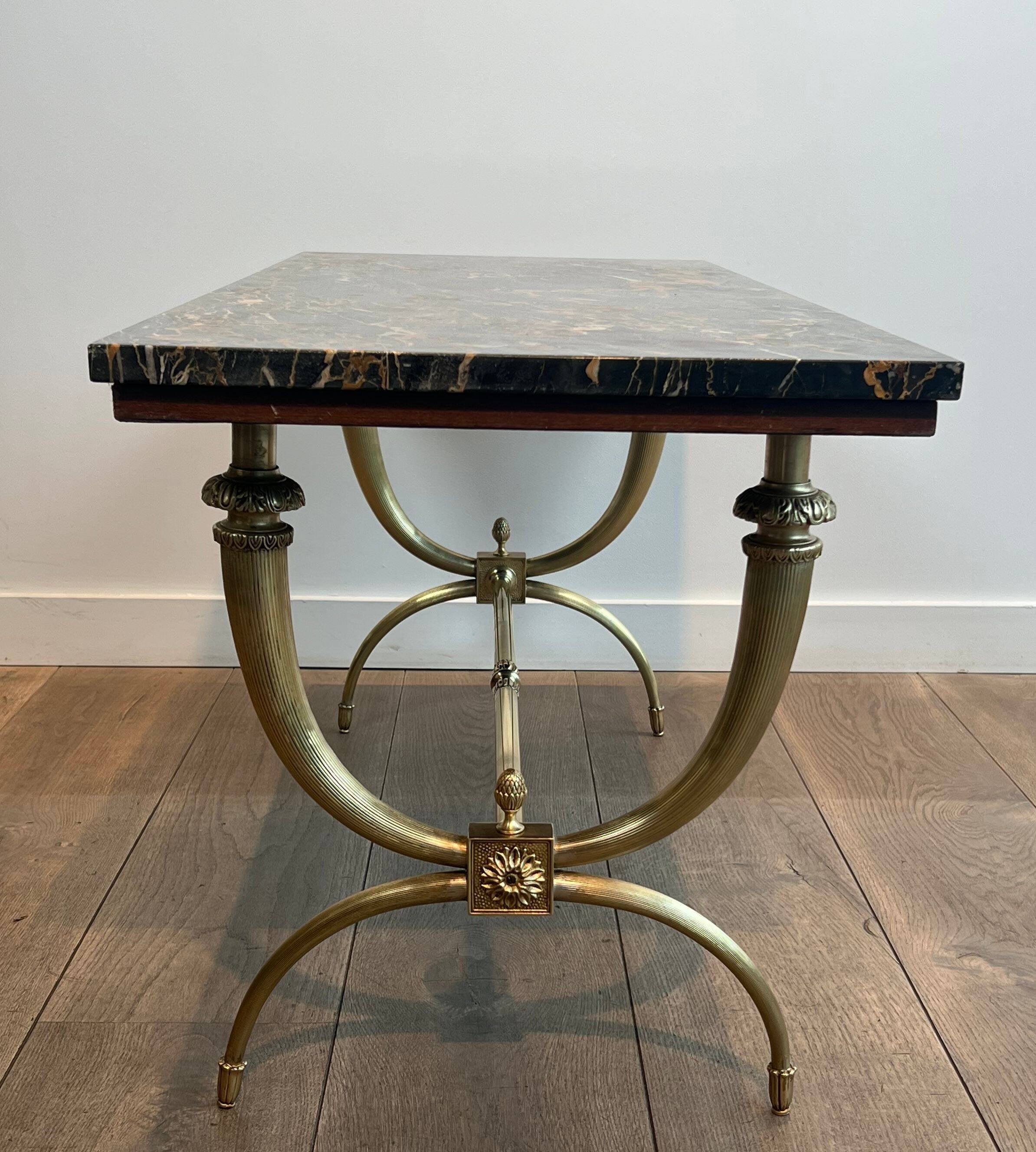 Neoclassical coffee table in brass and marble by Raymond Subes