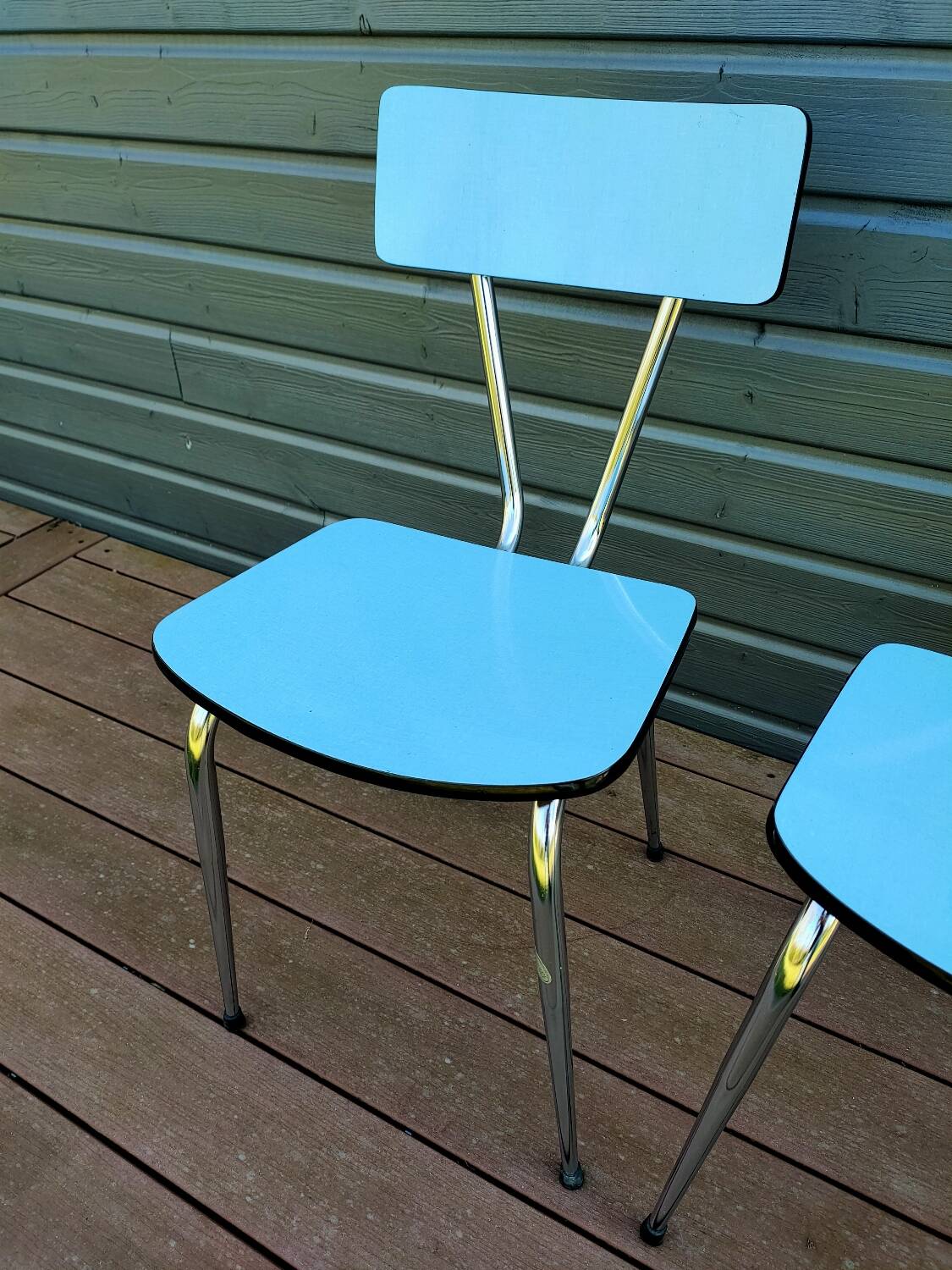 Pair of blue formica chairs