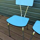 Pair of blue formica chairs