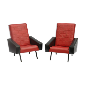 Pair of vintage black and red leather armchairs