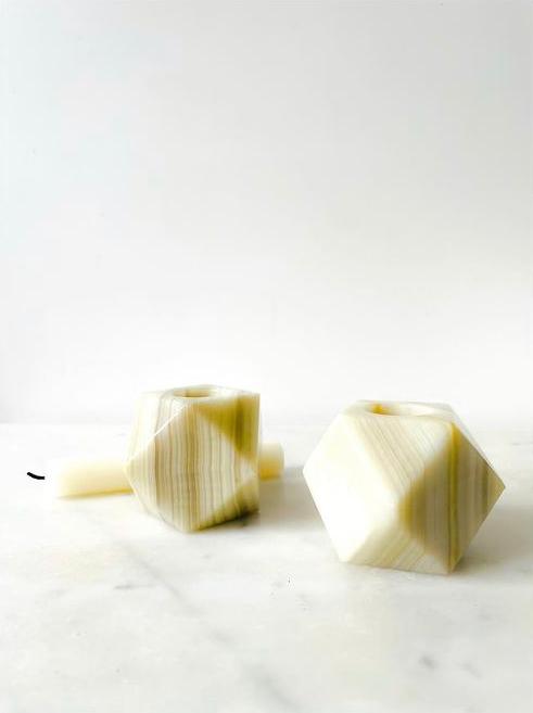 Pair of candlesticks in polished onyx