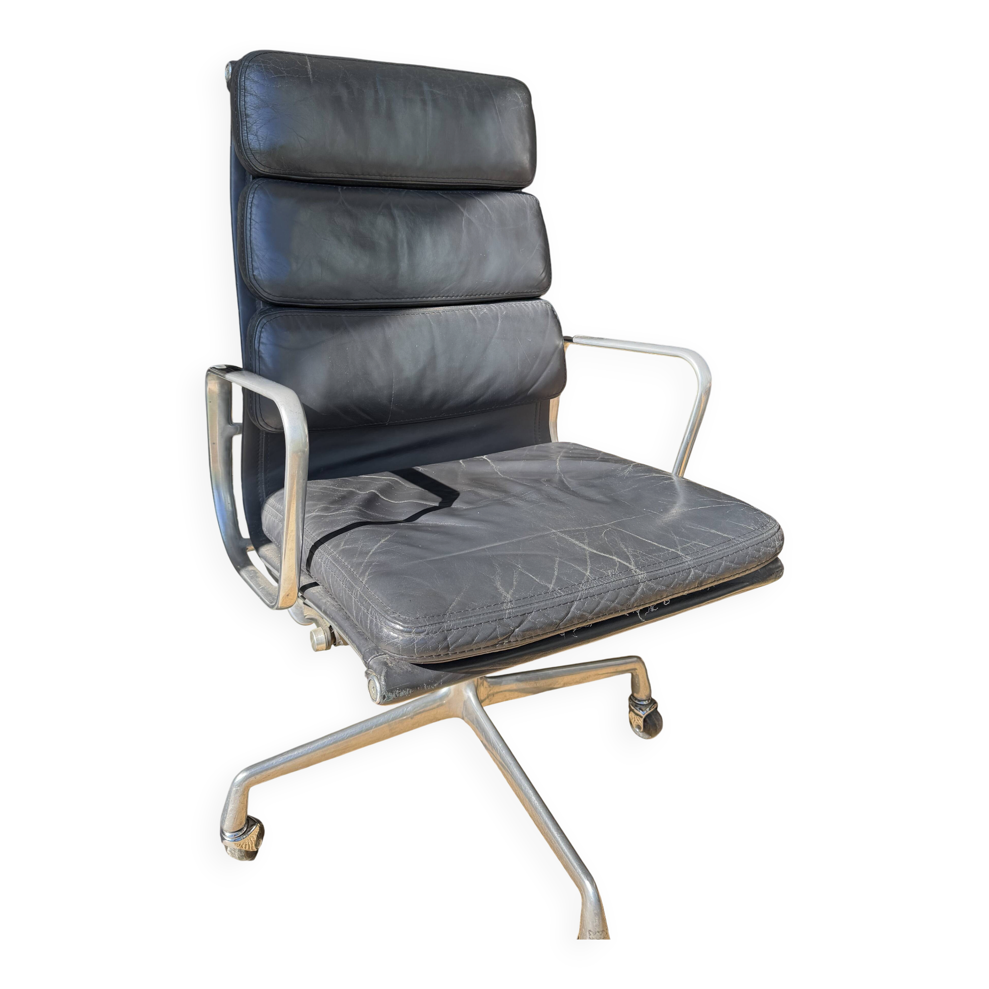 Eames soft pad chair in black leather, Herman Miller edition.