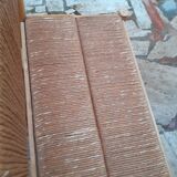 2 wooden and straw benches