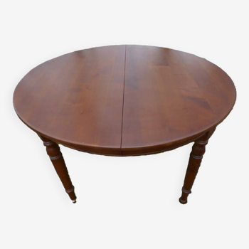 Extendable round table with extension to 235 cm in solid cherry wood, extensions not included