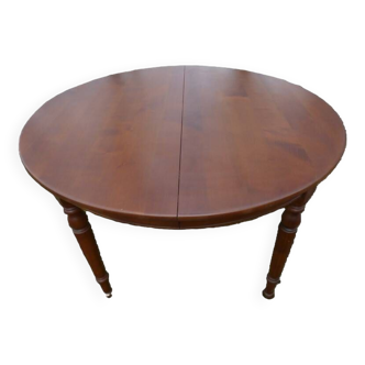 Extendable round table with extension to 235 cm in solid cherry wood, extensions not included