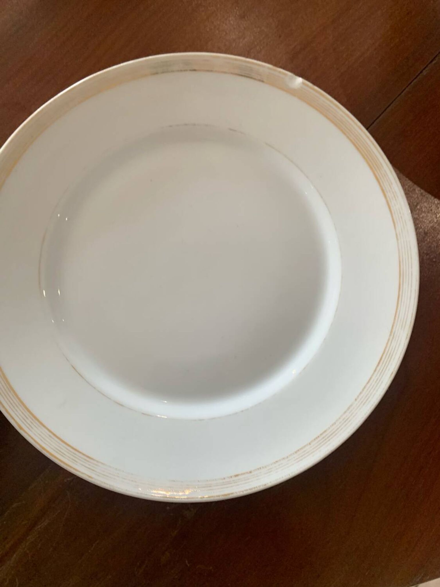 Lot of six flat plates, crockery, old white, gilded