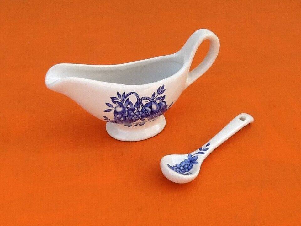 White porcelain gravy boat, fruit basket decor