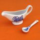 White porcelain gravy boat, fruit basket decor