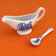 White porcelain gravy boat, fruit basket decor