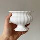 White ribbed ceramic cache-pot