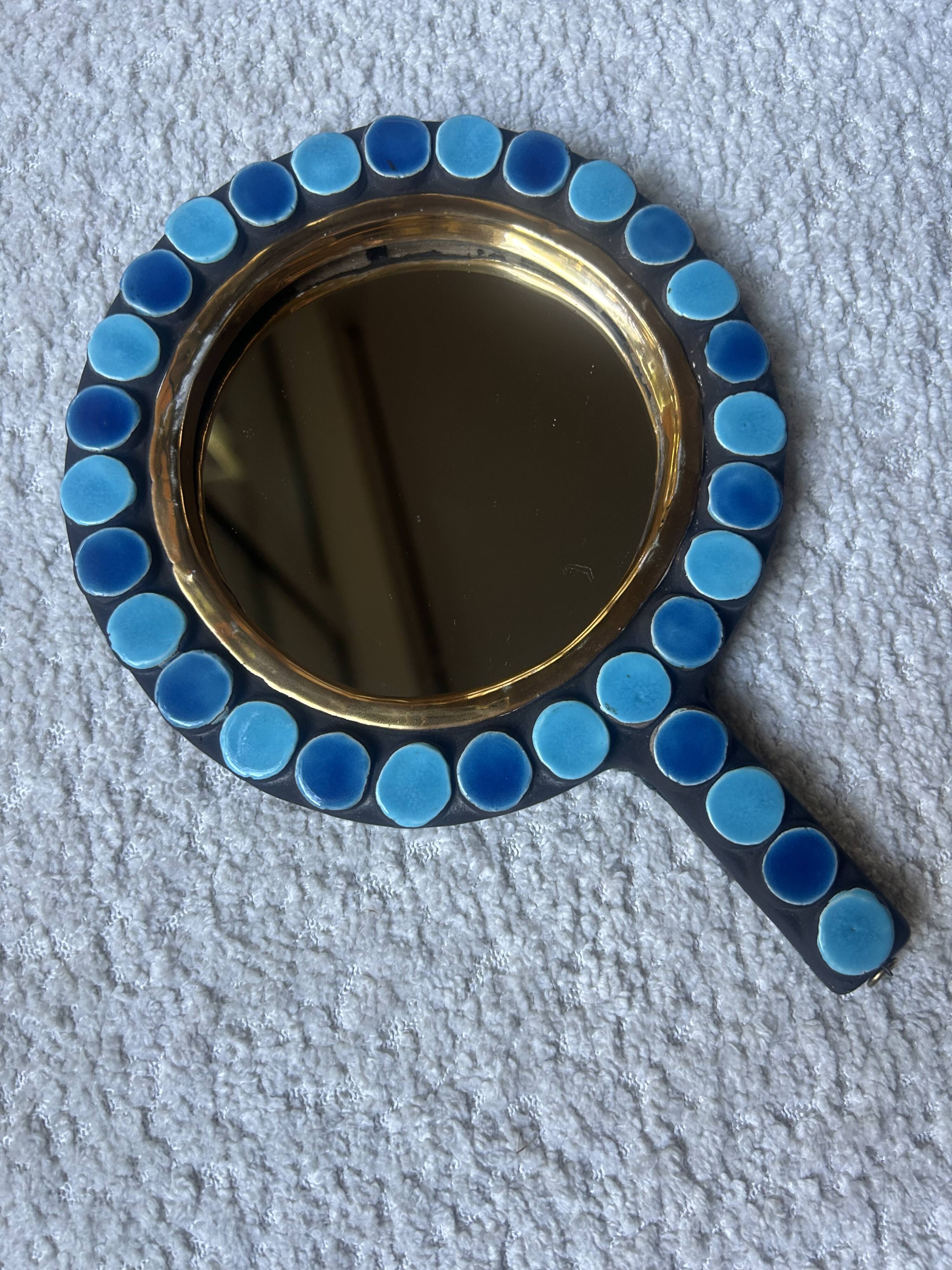 Mithé Espelt handheld mirror