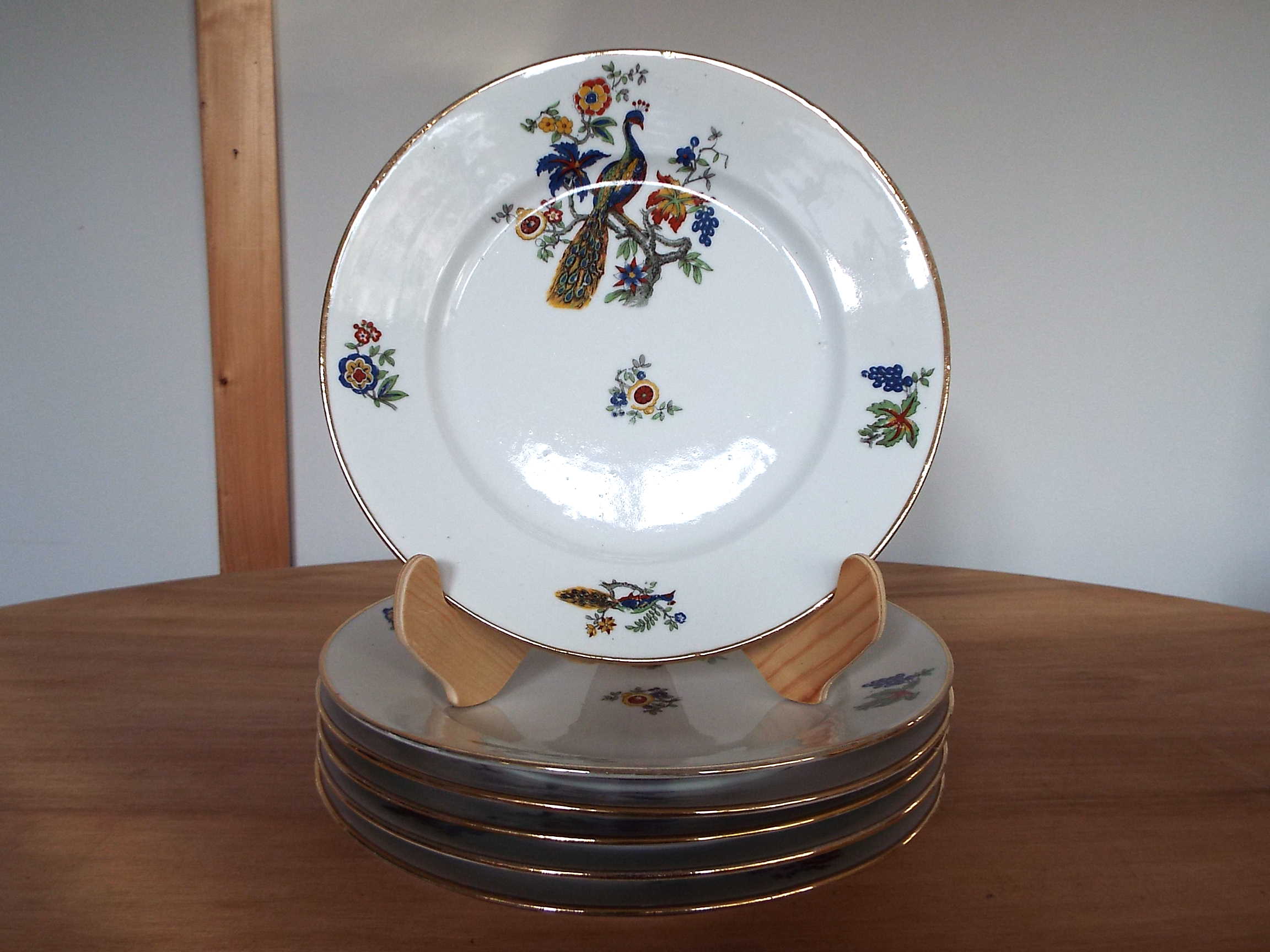 6 flat porcelain plates peacock