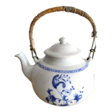Teapot in porcelain of Paris
