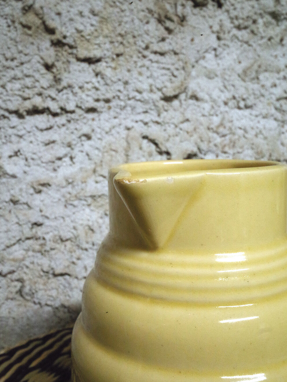 Pastel yellow ceramic pitcher