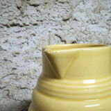 Pastel yellow ceramic pitcher