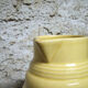 Pastel yellow ceramic pitcher