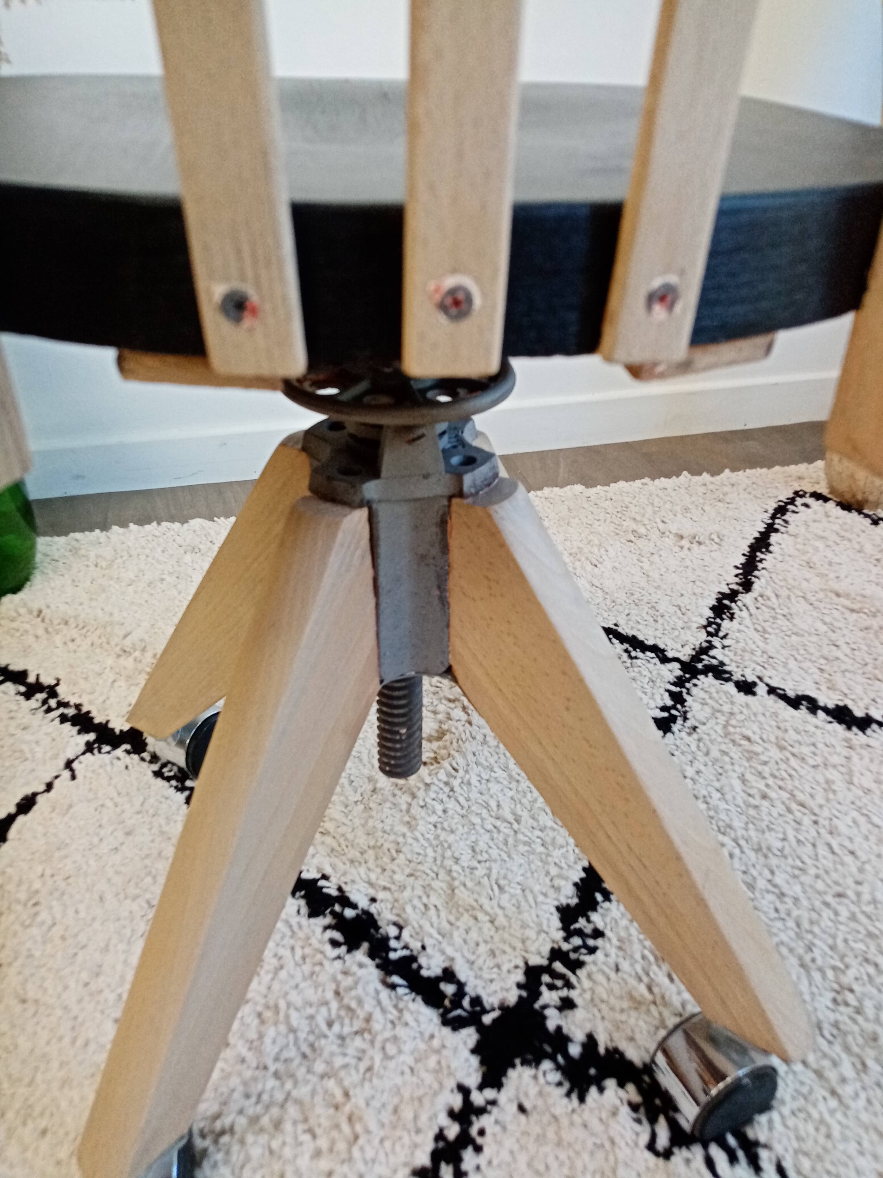 Black and wood workshop chair with metal base