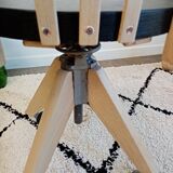 Black and wood workshop chair with metal base