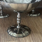 Vintage set of 6 finely engraved stainless steel bowls.