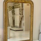 Miroir ancien Louis-Philippe sculpté et doré à la feuille
