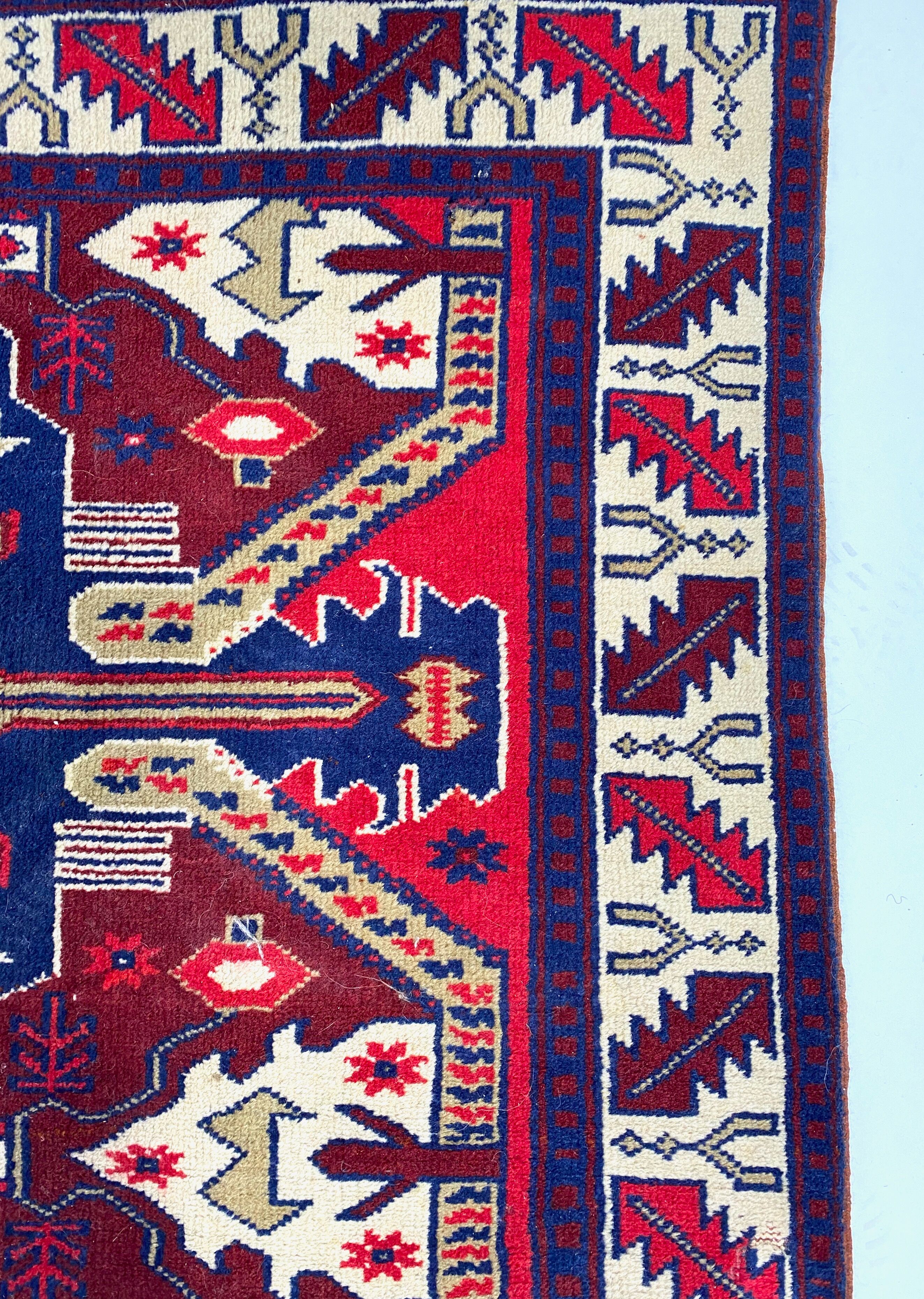 Handmade oriental wool rug 200cmx110cm