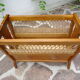 Oak and rattan magazine rack
