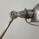Jieldé lamp with 2 articulated metal arms, industrial style.