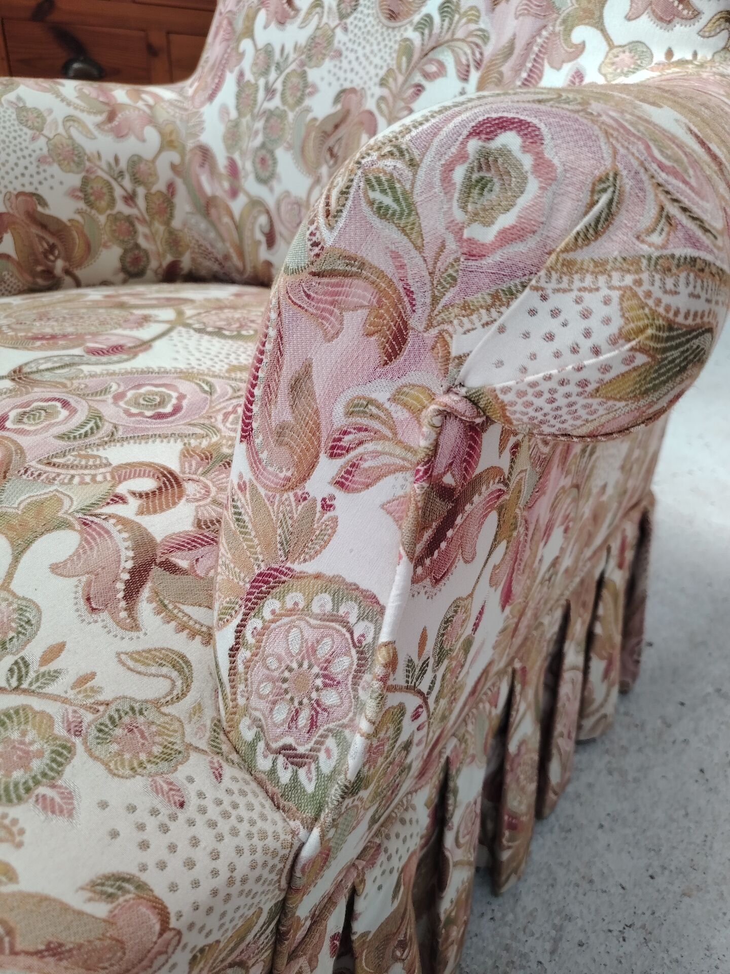 Antique armchair fully restored with brass wheels.
