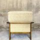 Fauteuil vintage en bois et laine