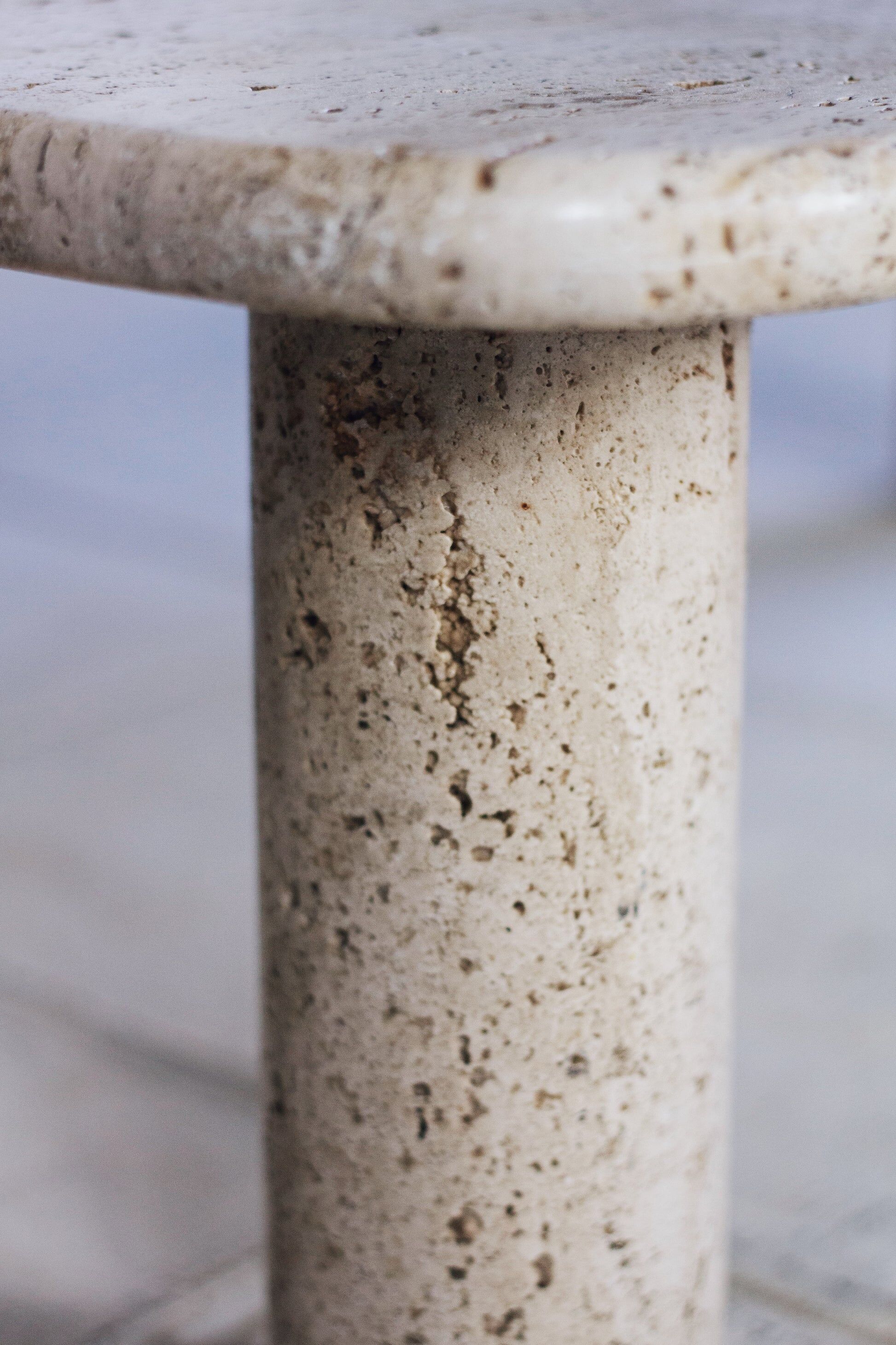 Travertine coffee table in the style of Angelo Mangiarotti, 1970.