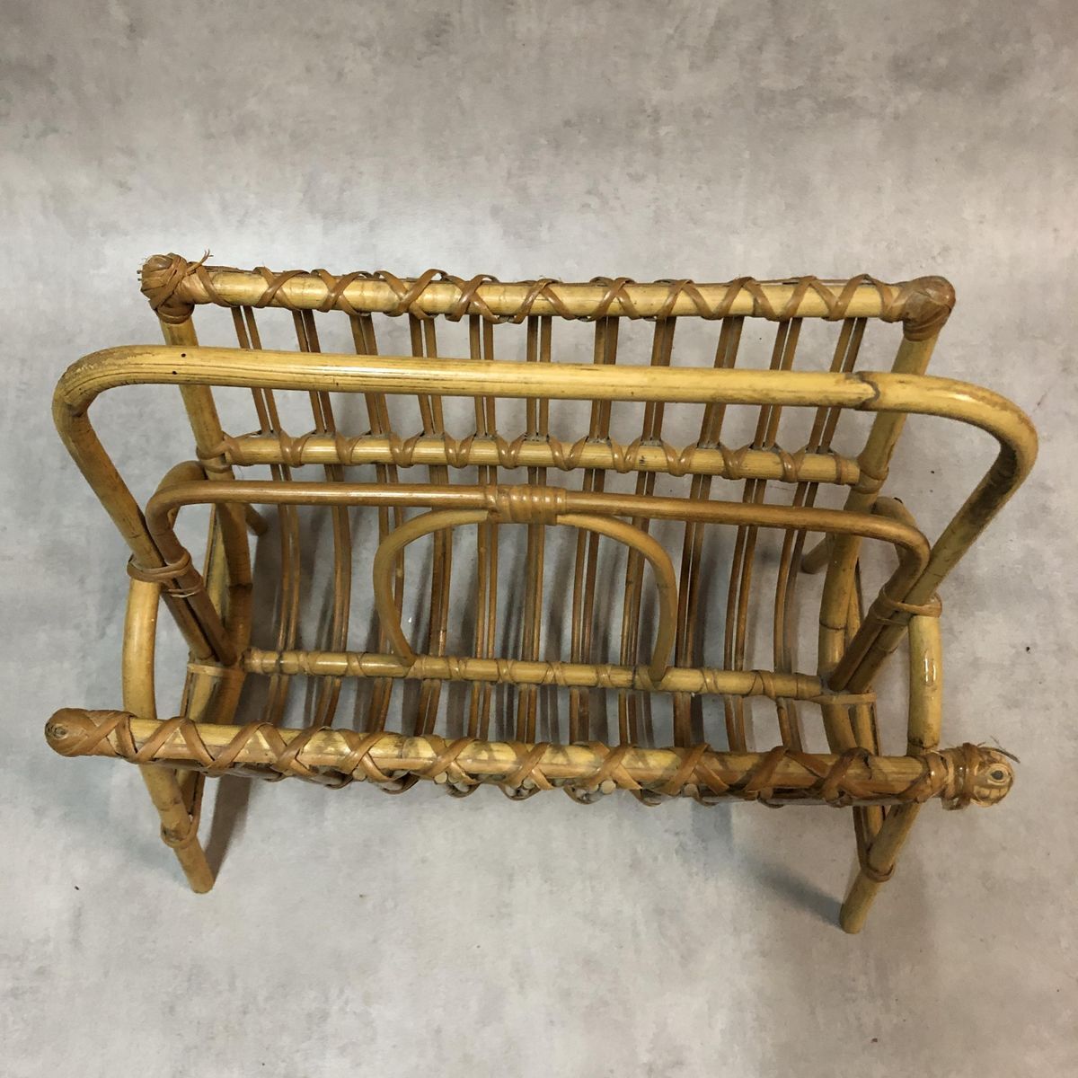 Mid-century magazine holder in rattan France 1960s