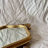 Ancien miroir mural biseauté en bois massif doré