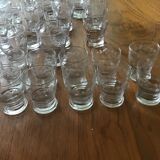Glassware set with carafes, pitcher and bottle coasters